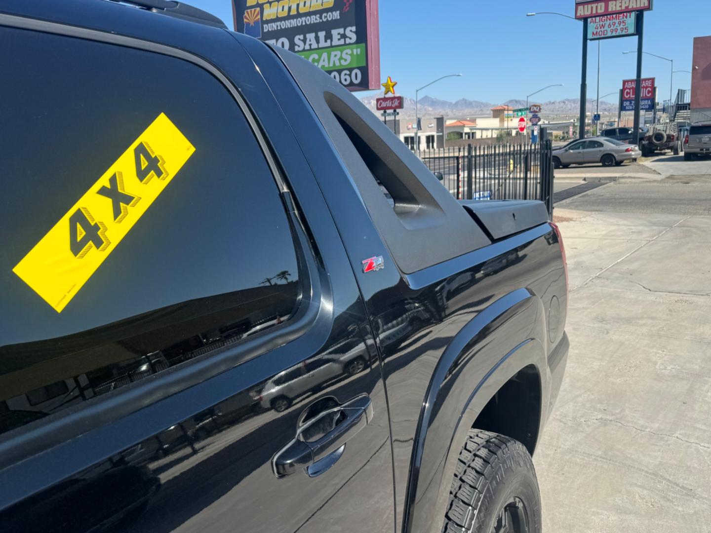 2011 Black /Black Chevrolet Avalanche (3GNTKFE31BG) , located at 2190 Hwy 95, Bullhead City, AZ, 86442, (928) 704-0060, 0.000000, 0.000000 - 2011 Chevrolet avalanche z71 . New motor with receipts . Lots of new parts . Lift kit , custom tires and wheels . 1 owner . Super clean , great running truck - Photo#9